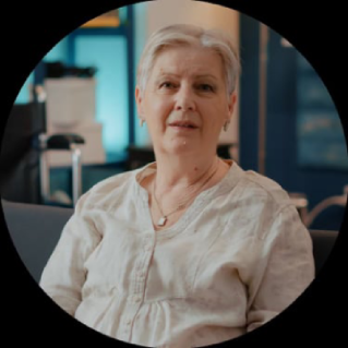 Older female customer expressing satisfaction and improved sense of overall well-being